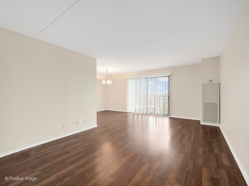 Changed floor to hardwood and changed lighting and