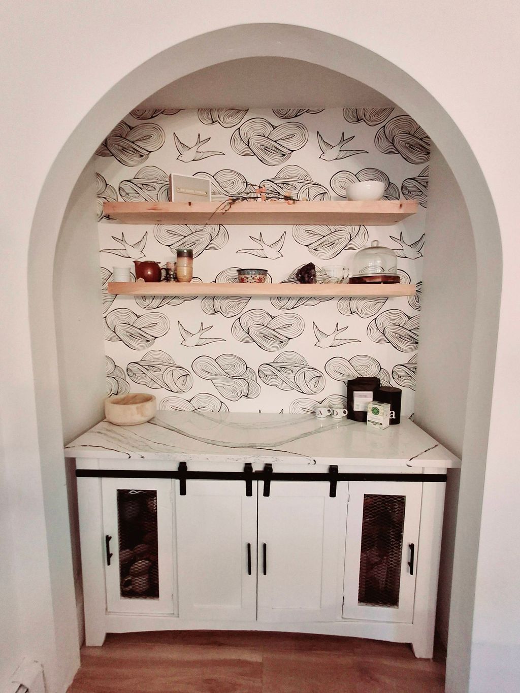 Built arched opening, added wallpaper, floating sh