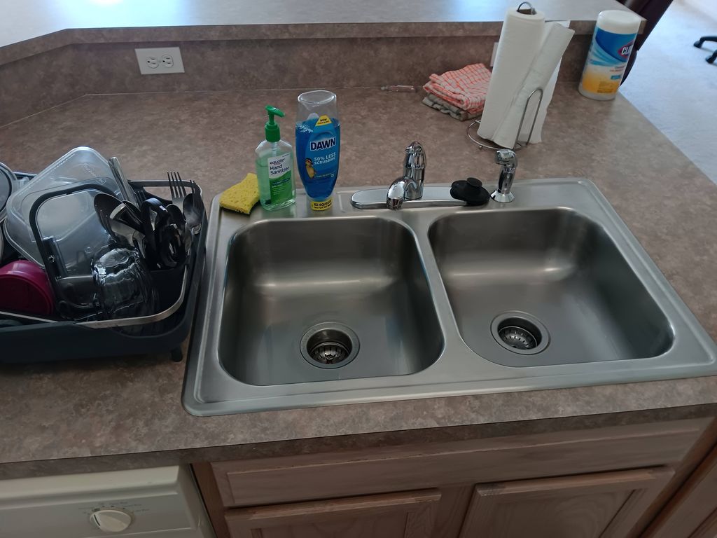 Scrubbed, sanitized and sparkling clean sink
