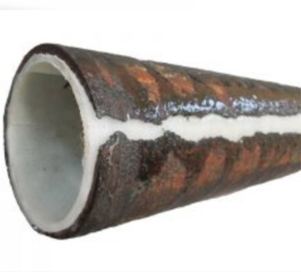 Rotting cast iron drain pipe lined