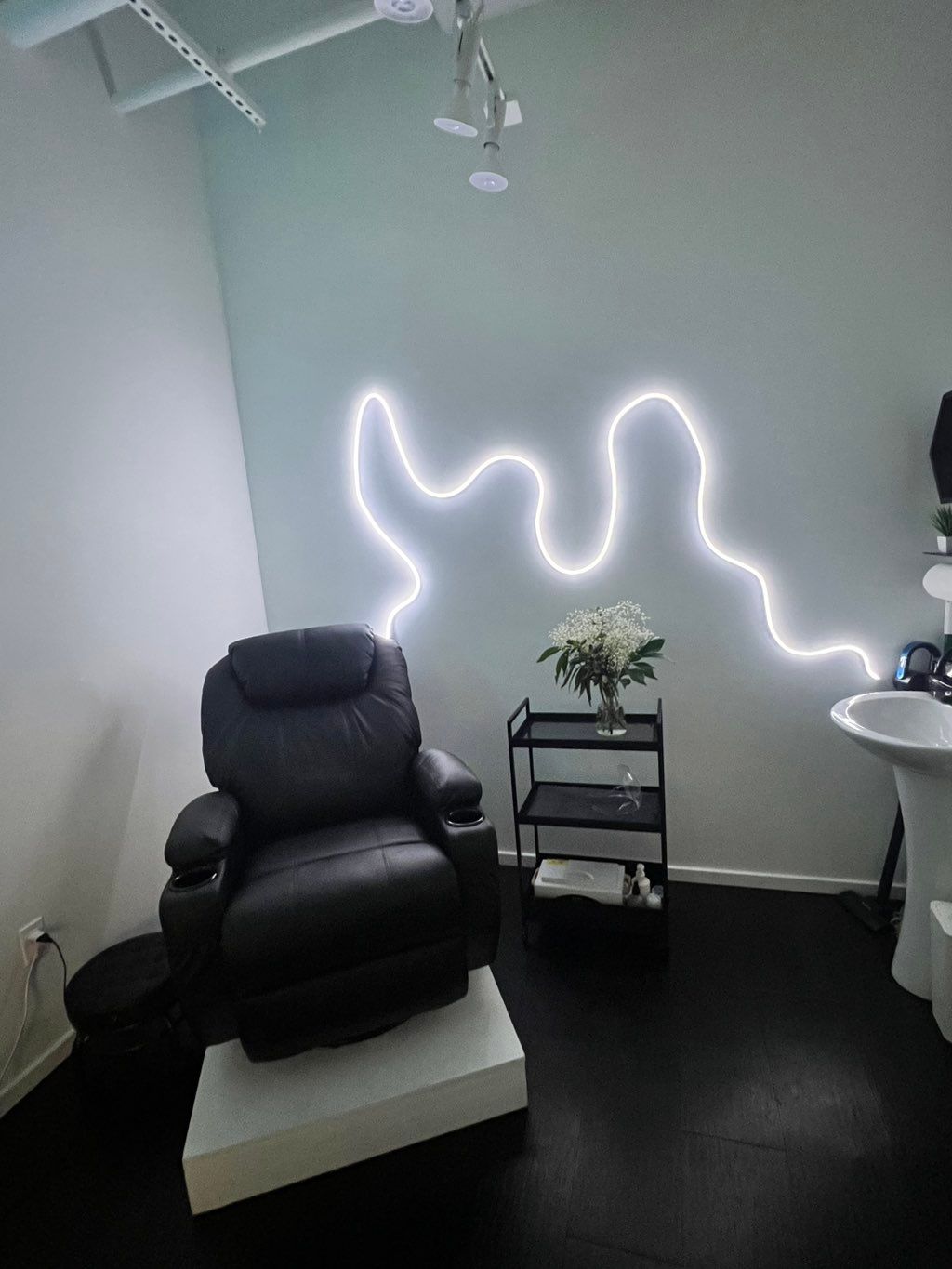 installation of led strip and stand under chair 