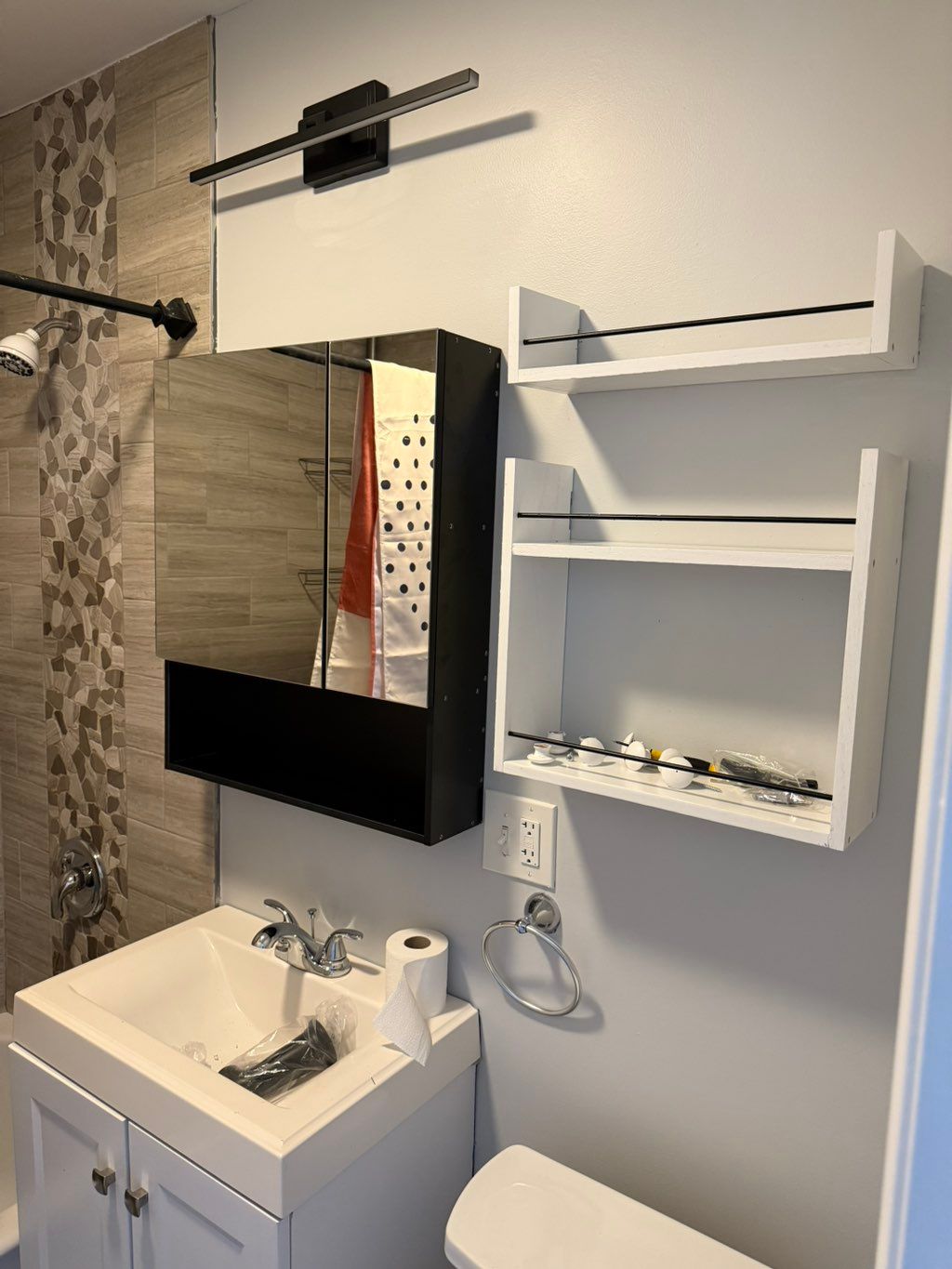 Replacing bathroom mirror, light, and shelf