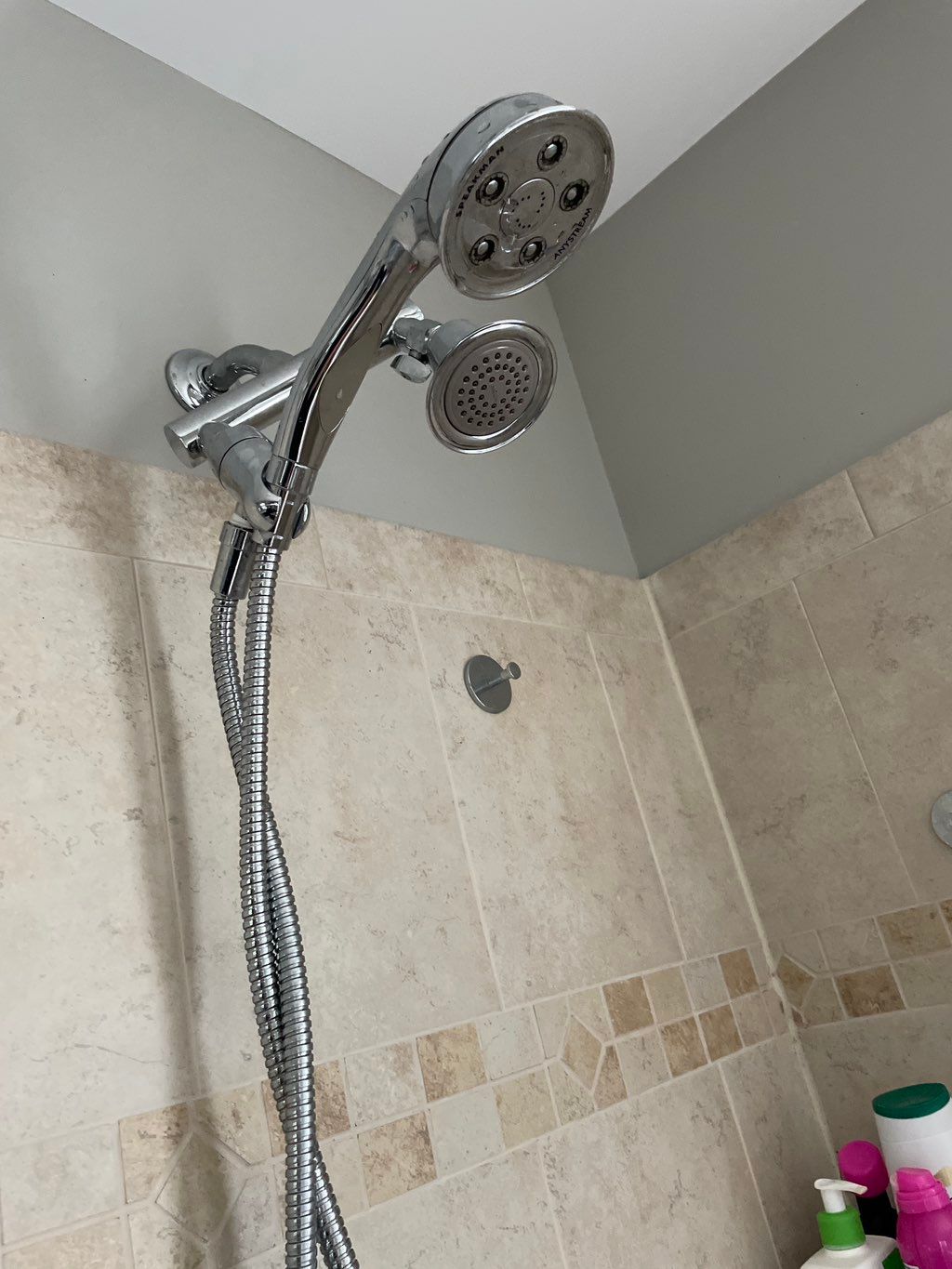 Upgrade your shower head to include a handheld