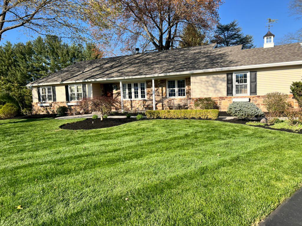 Nice finished lawn mowing and spring cleanup/ mulc