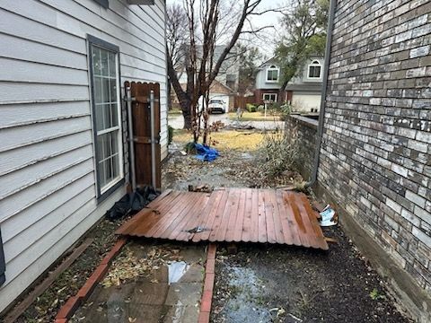 Fence repair after a storm