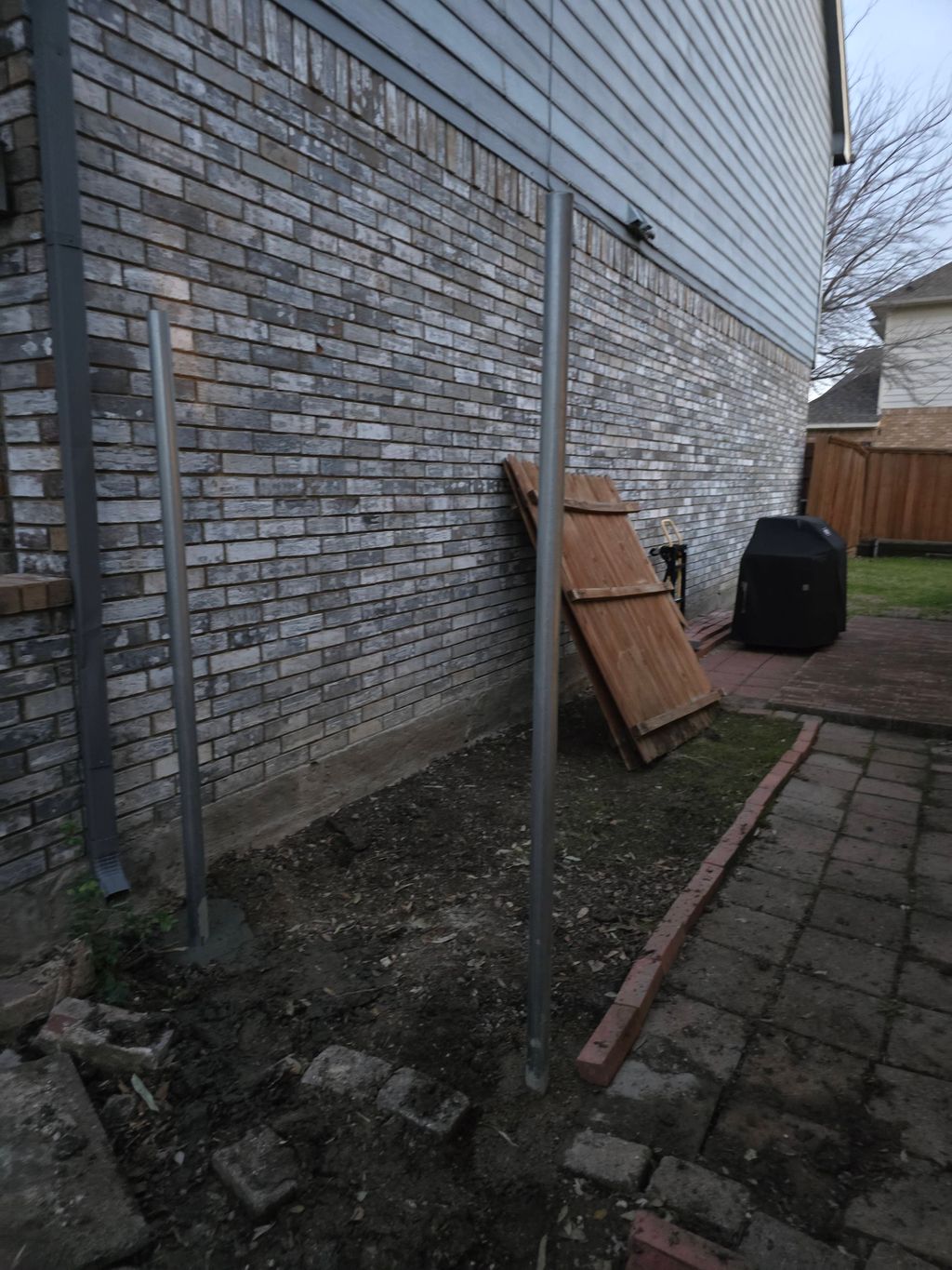 Fence repair after a storm