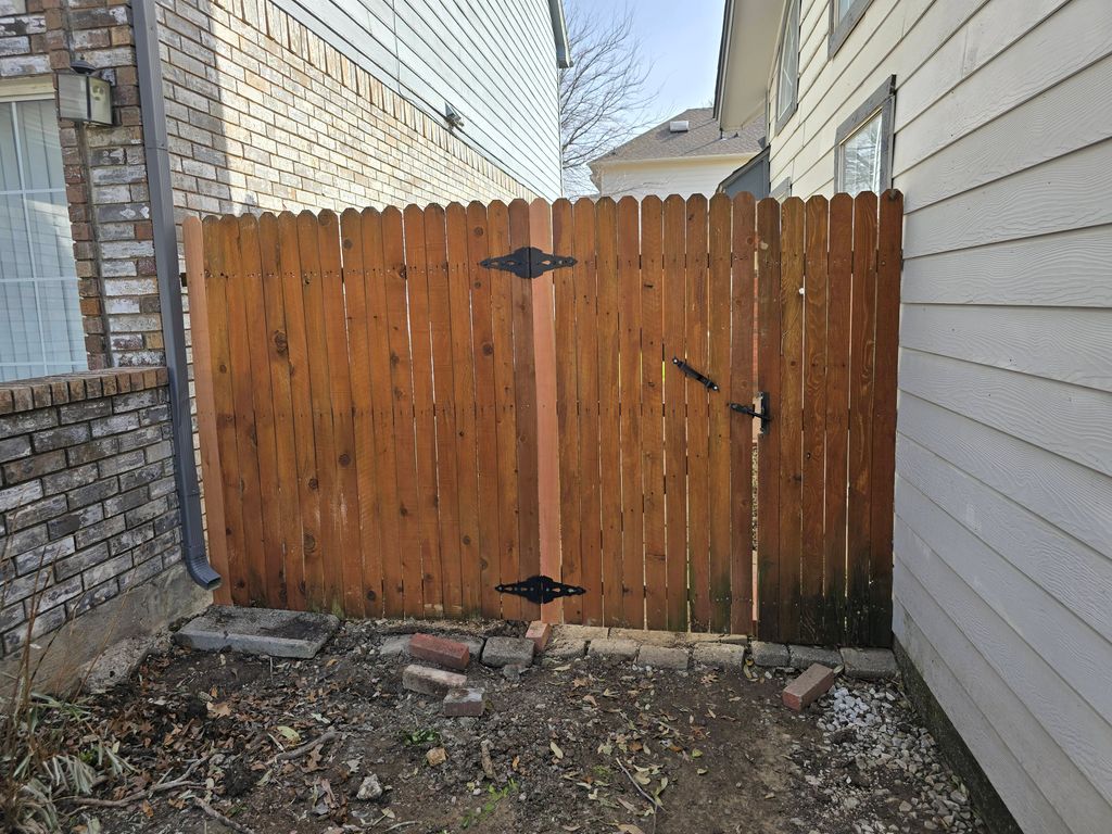 Fence repair after a storm