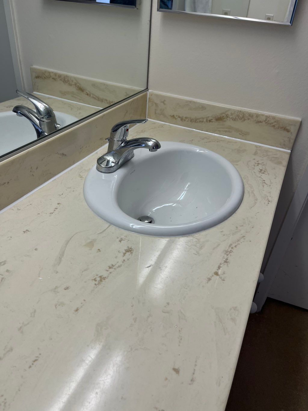 New drop in sink,faucet and apply silicone on coun