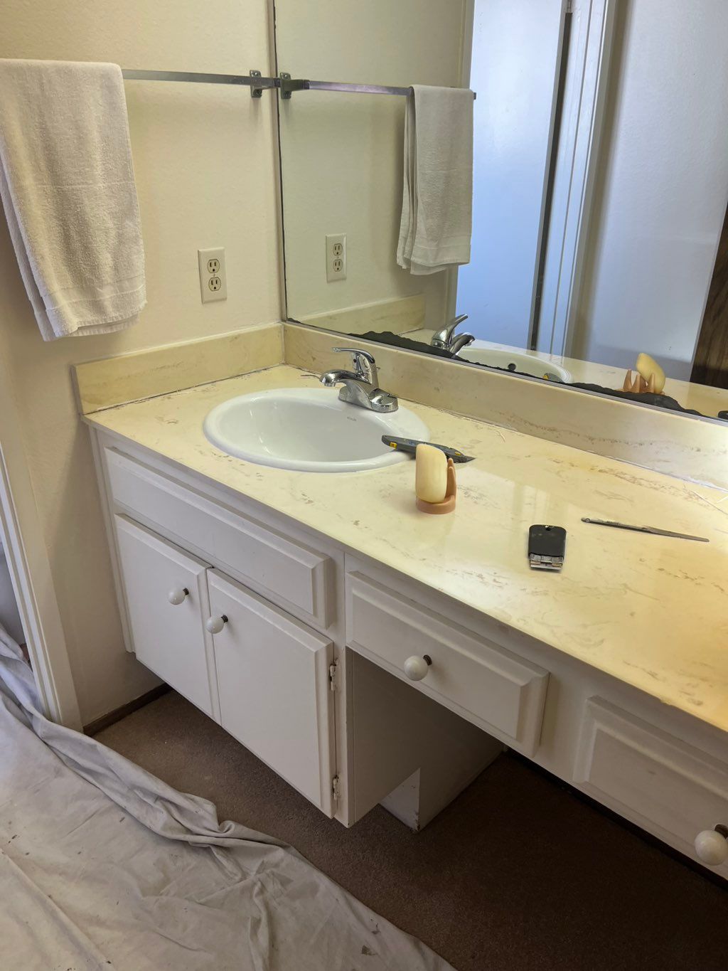New drop in sink and faucet and removed old dry si