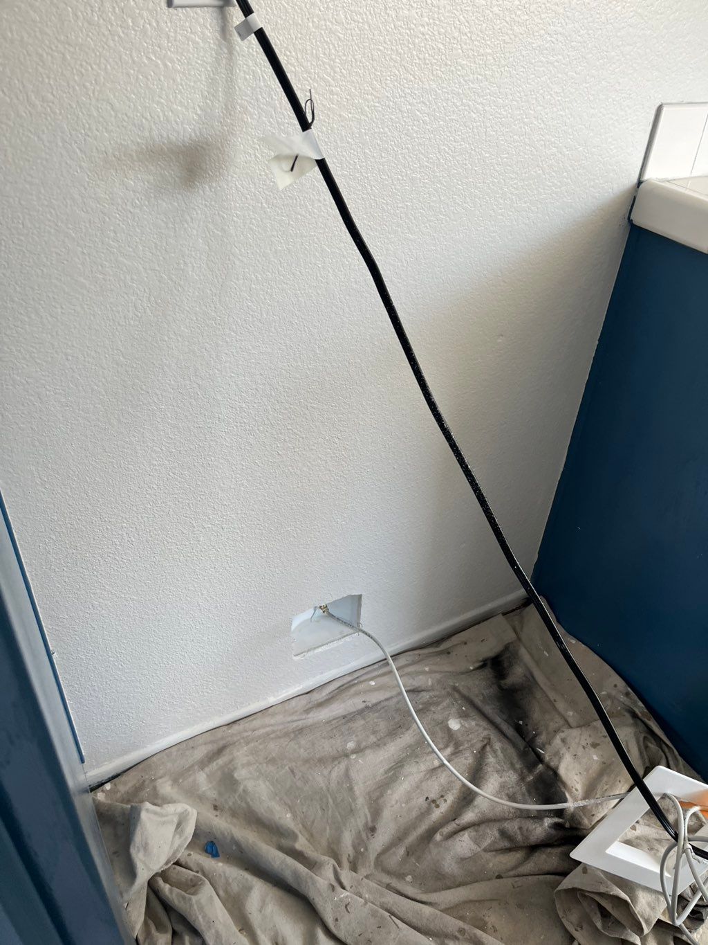 Drywall repaired with spray texture 