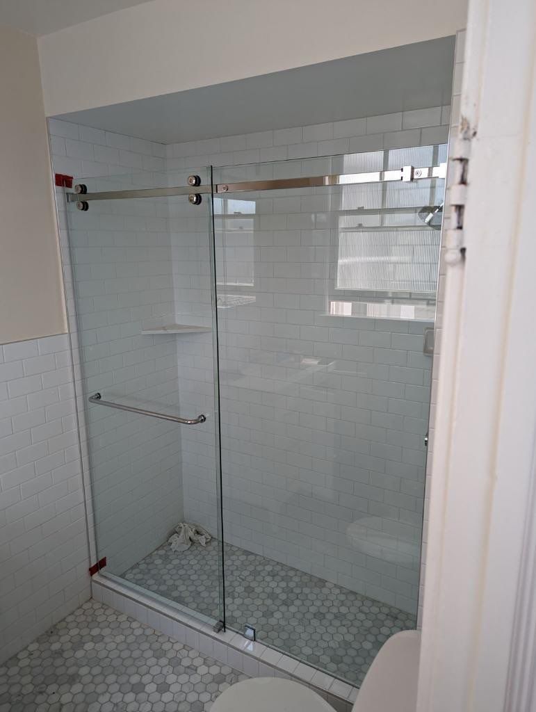 Sliding shower door installation 