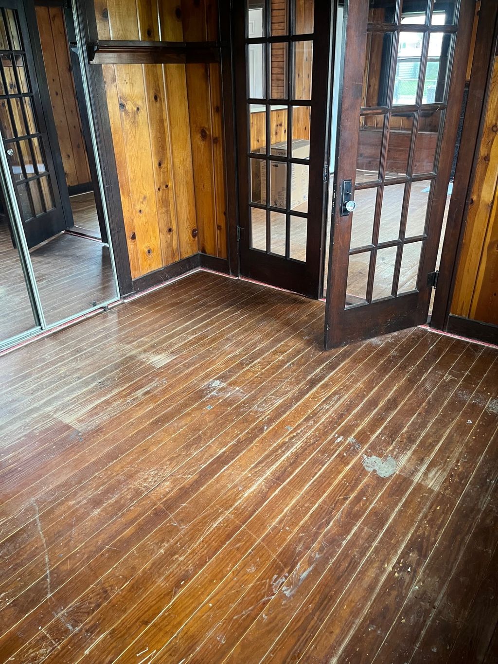 Before (2) of a grey carpet installation.