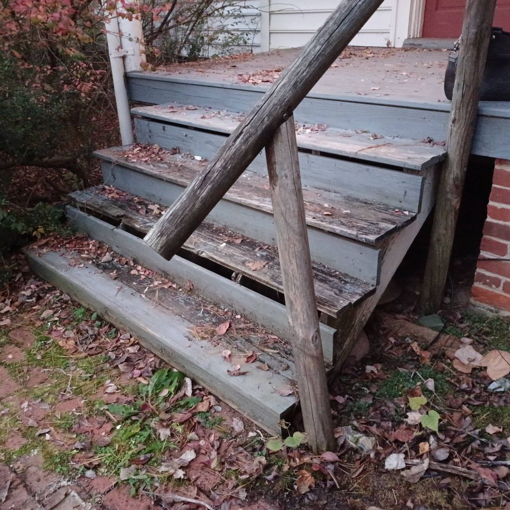 main staircase with major wood rot.