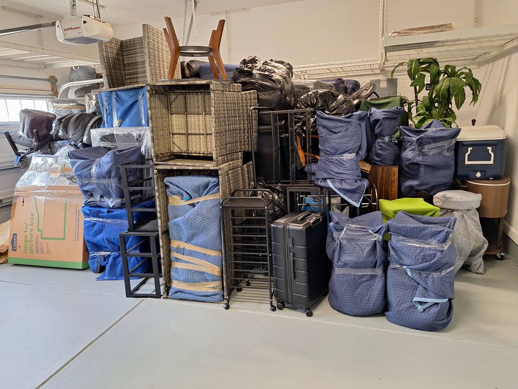 Residential garage pre-stage furniture pad process