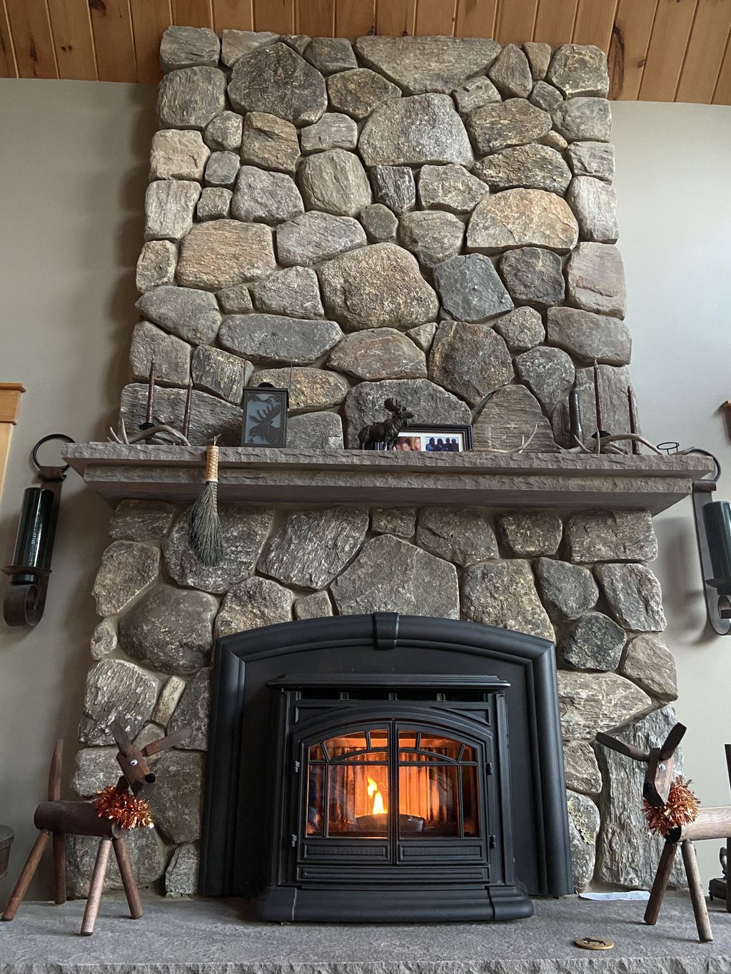 Mountain home fireplace with pellet stove insert