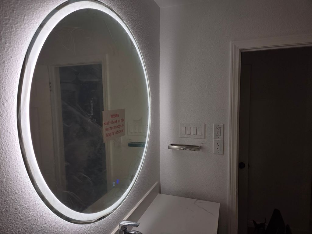 Electrical switches, outlet, and lighted mirror in