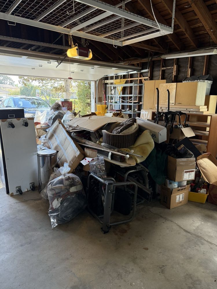 “Garage packed and overflowing — time to clear it 