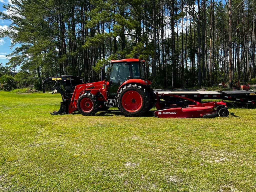 75HP tractor and 7ft Bushog. 
