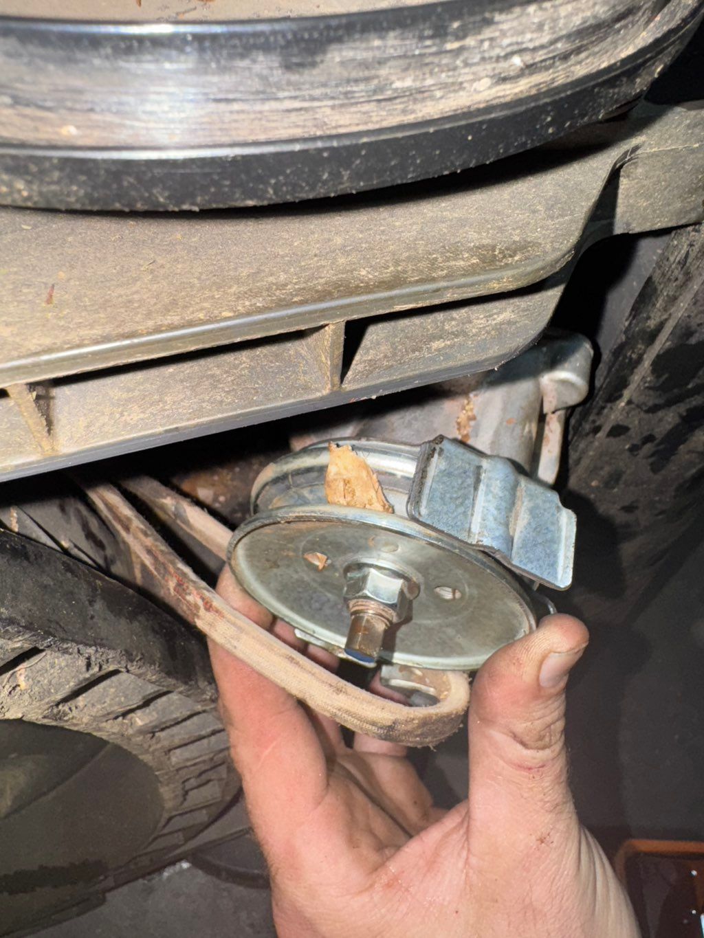 Wood chip in push mower transmission pulley preven