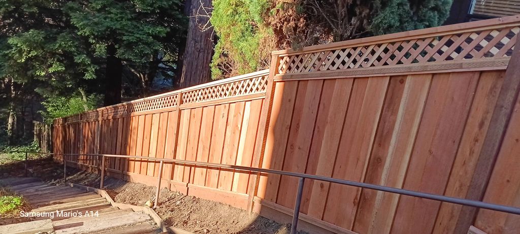 6ft redwood fence and 1ft letter 75ft long 