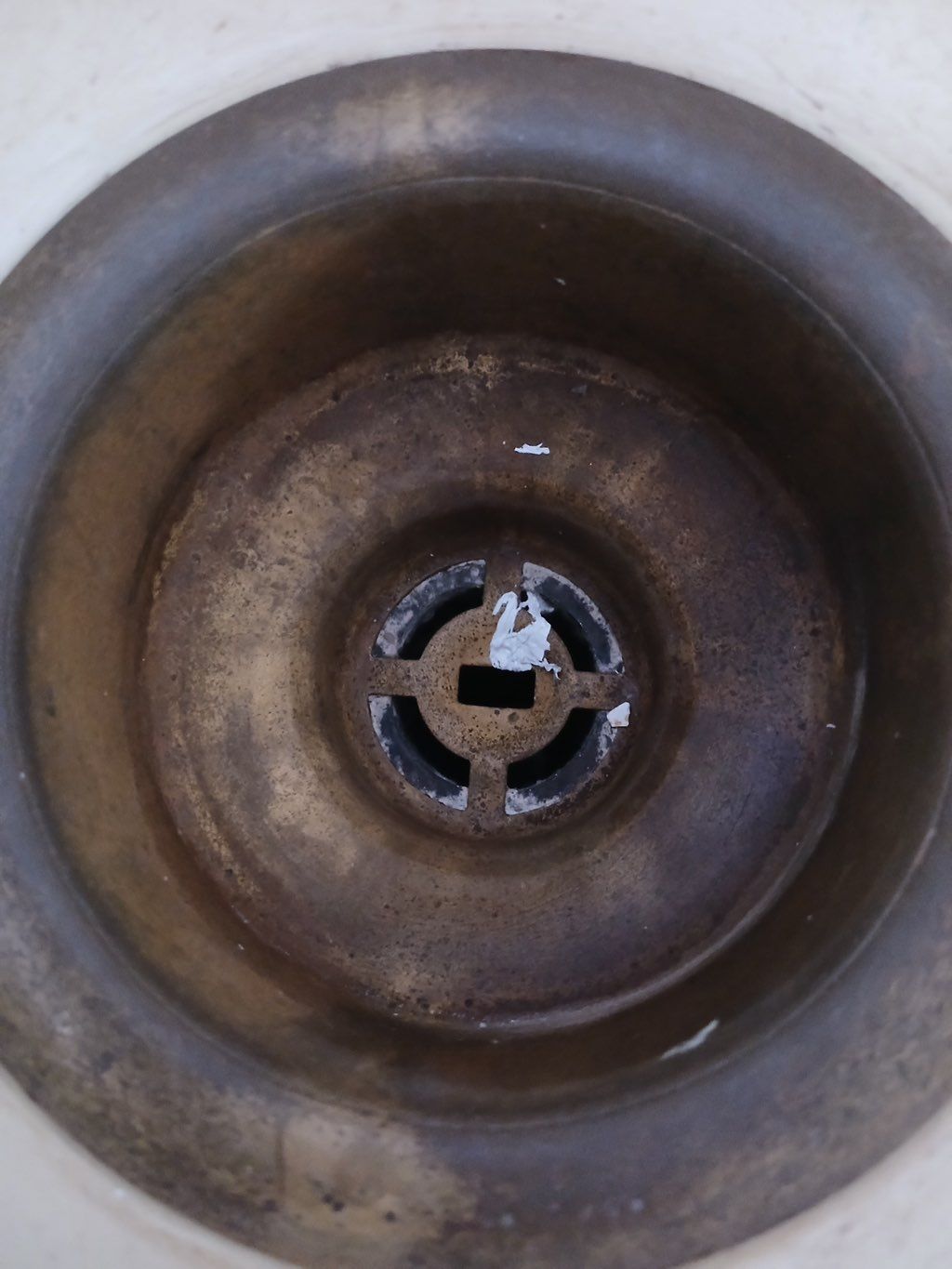 Before:
Clogged with grime, coated in buildup, and