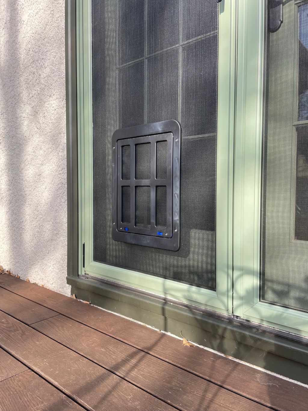 new pet resistant screen and pet door installation