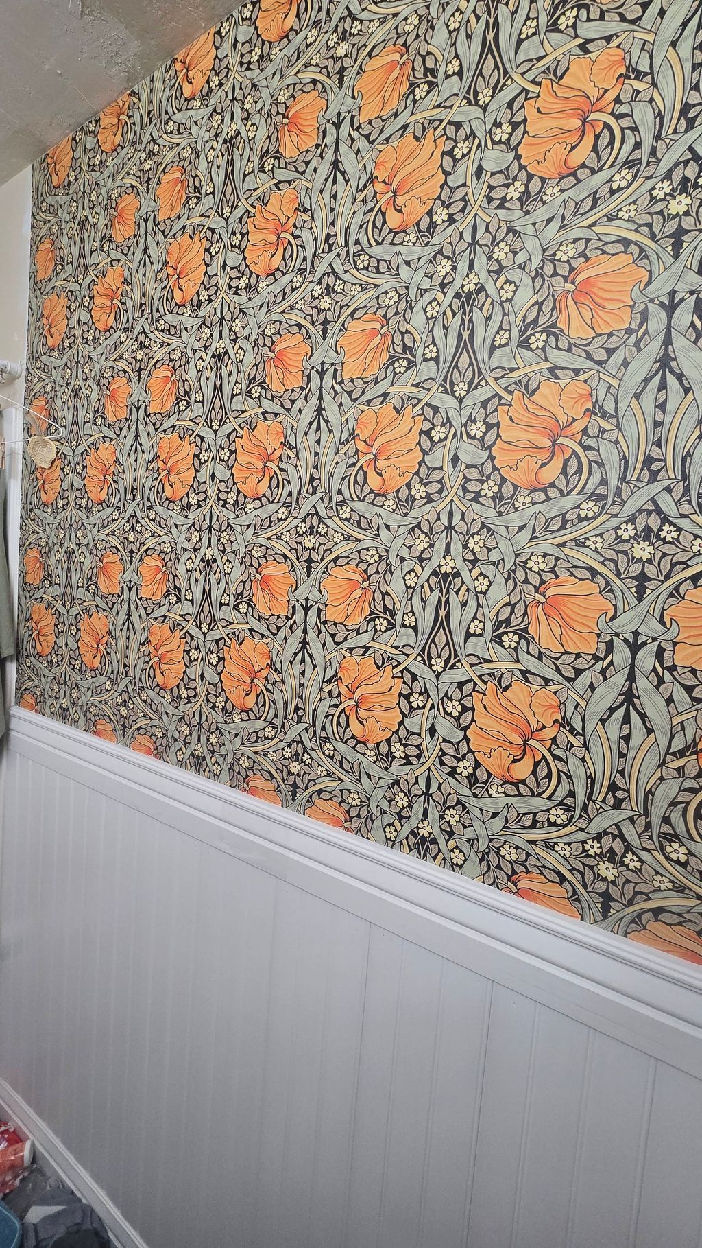 Wallpapered and Wainscoting installed