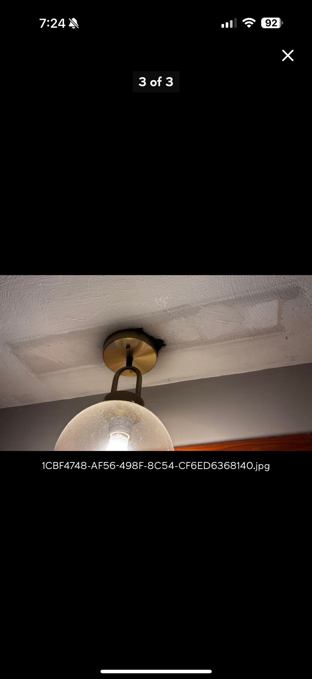 A hole has developed around a light fixture and th