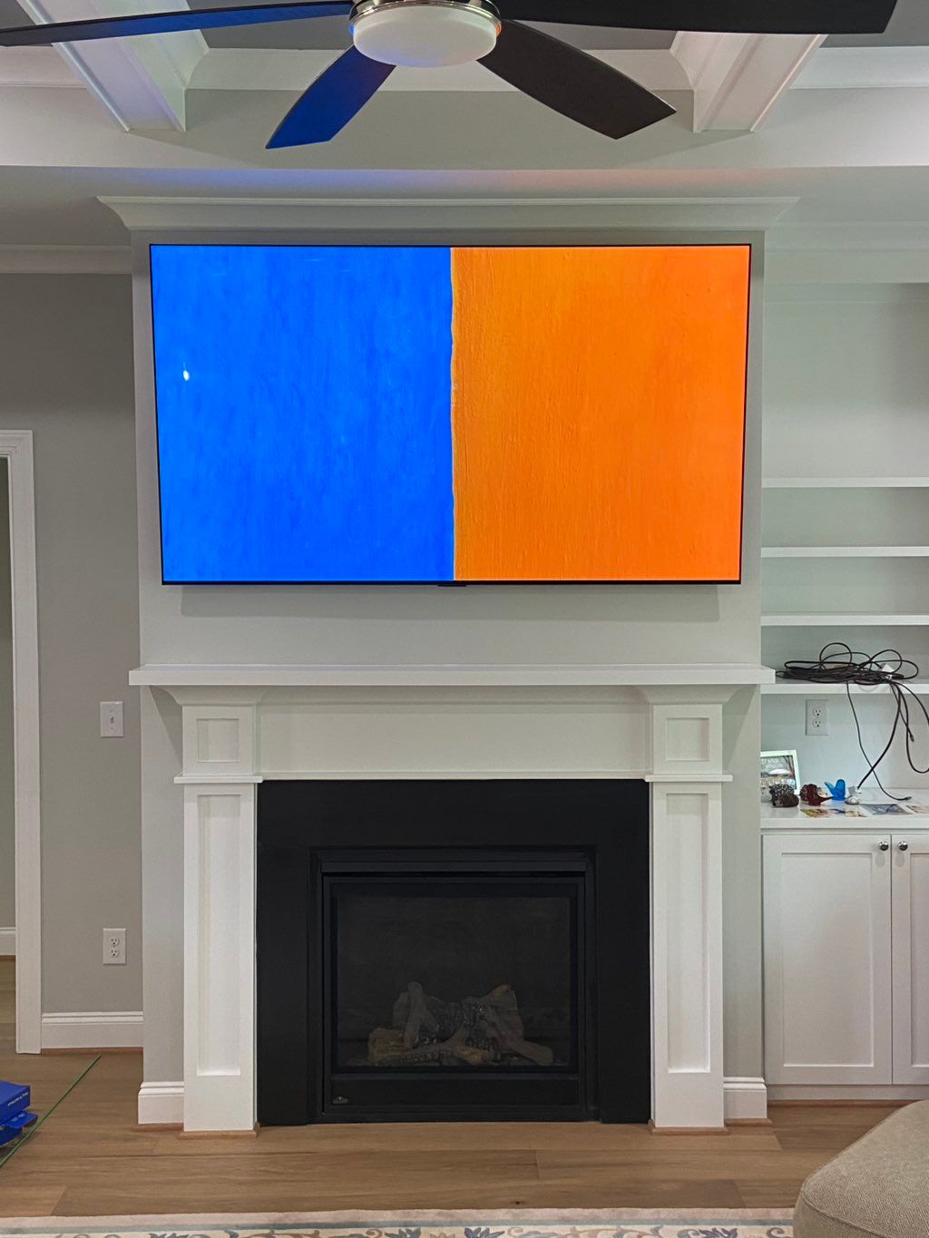 75inch w/wire concealment over fireplace 