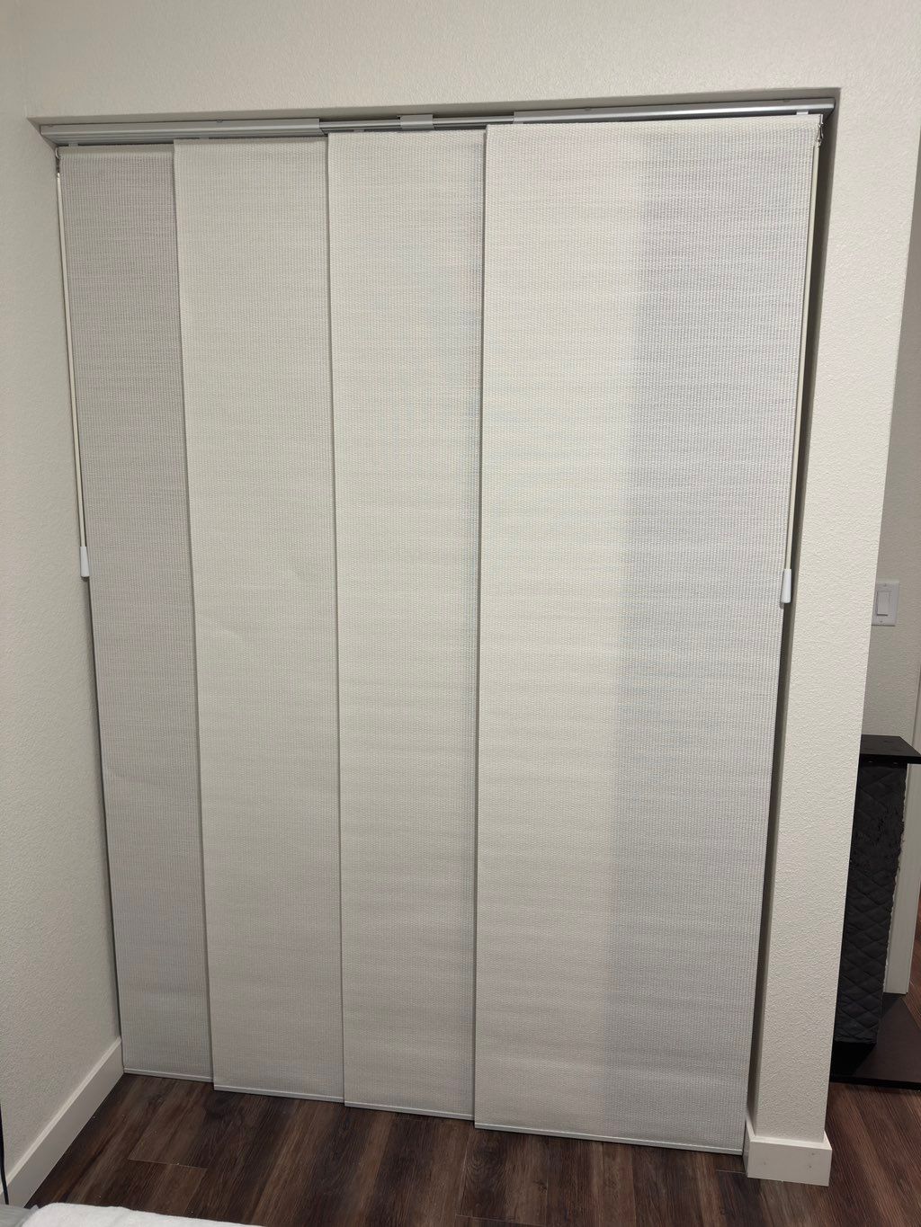 Installed Adjustable Panel Track Blinds.  I can al