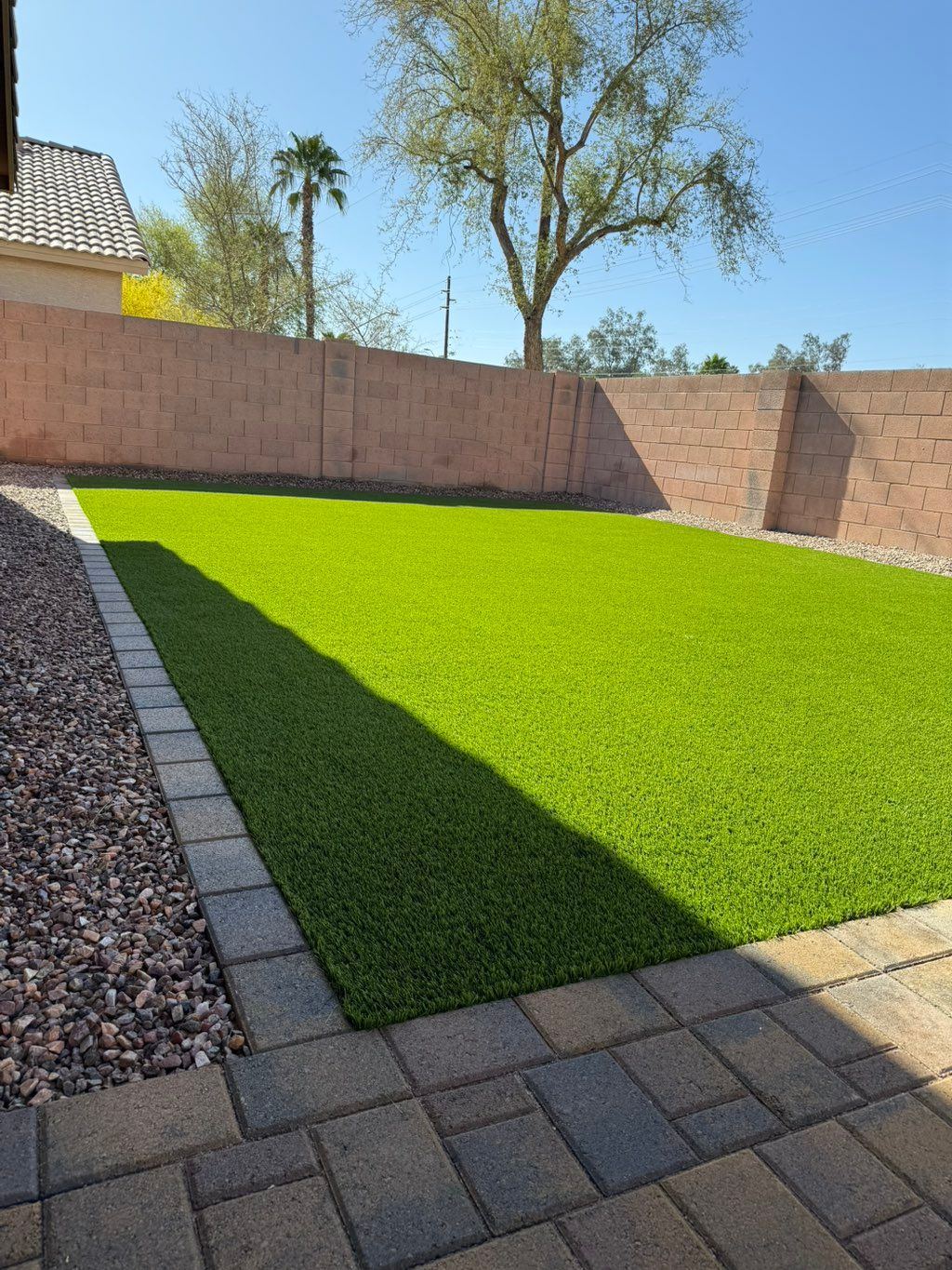 Synthetic grass, No maintenance, no high water bil