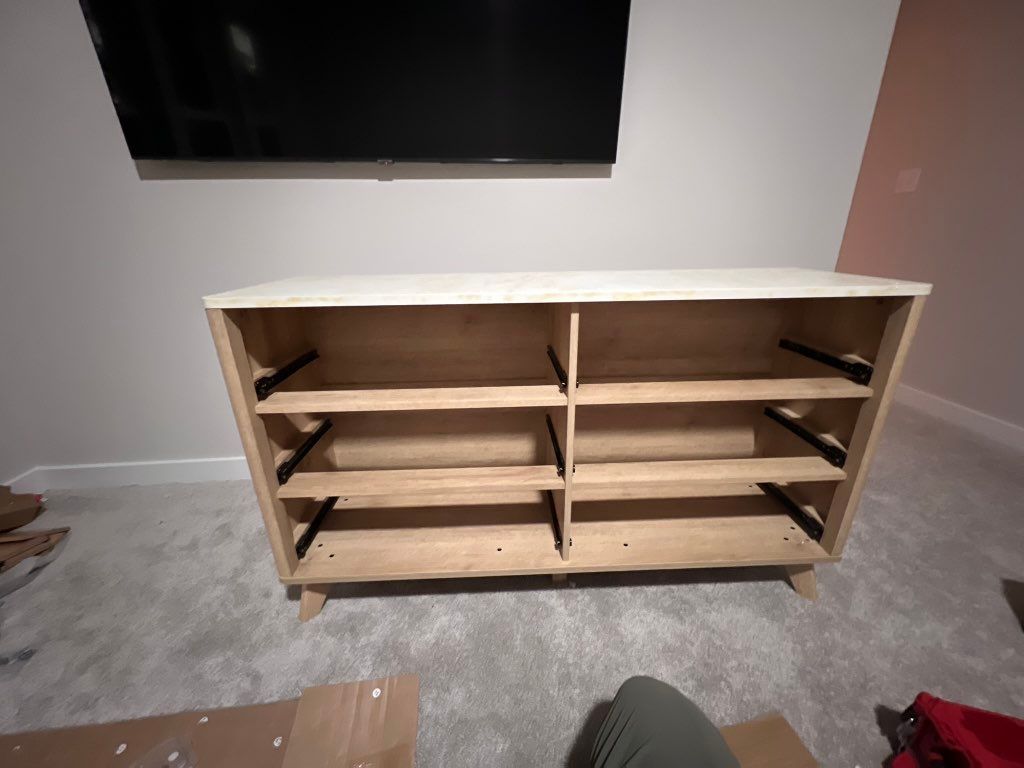 Assembly of ikea dresser. The fun ones 😁 hung TV i