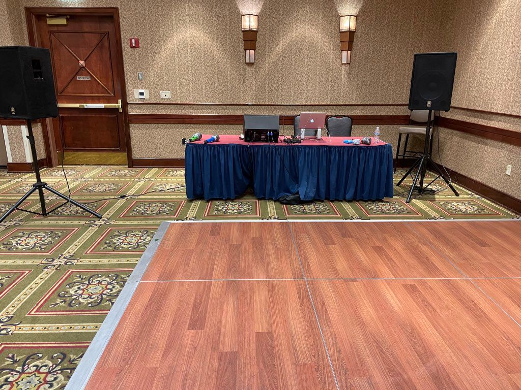 Setting up equipment at the Capital Plaza Hotel, T