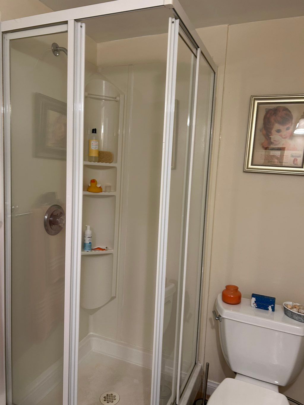 The shower walls were acrylic composite board with
