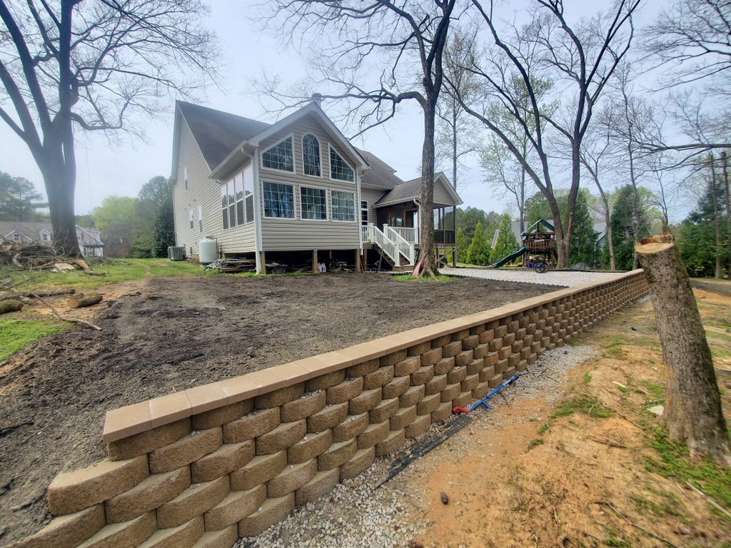 70 foot retaining wall and patio, to code, with dr
