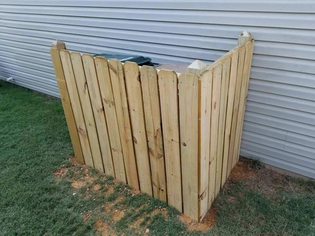 HOA required bin concealment fence. 
