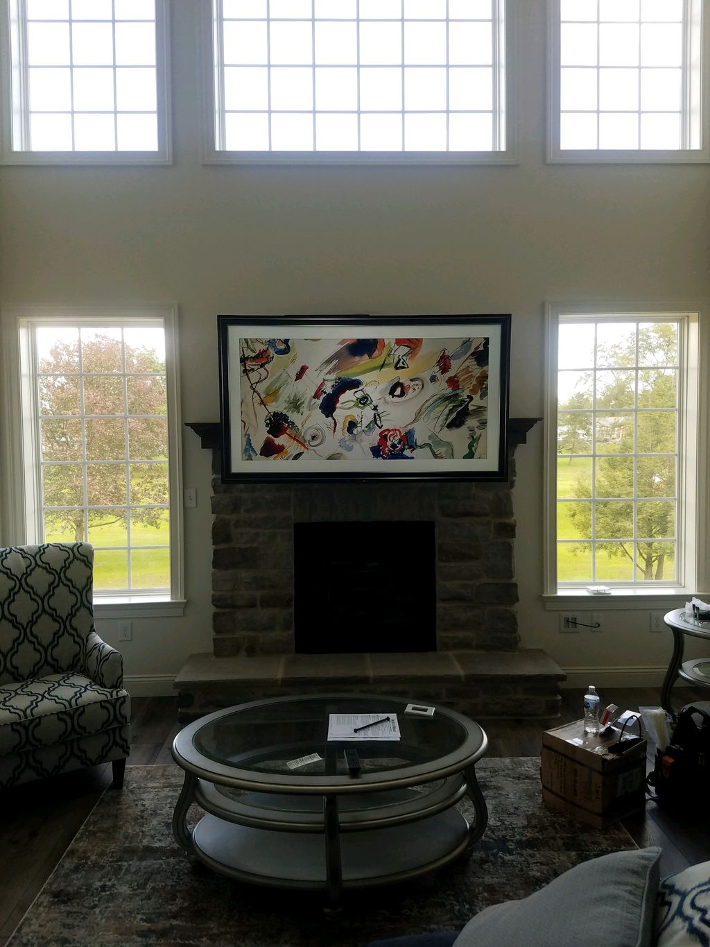 Over the fireplace mounting. 