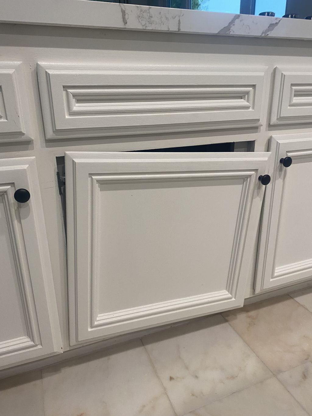 Cabinet door adjustment