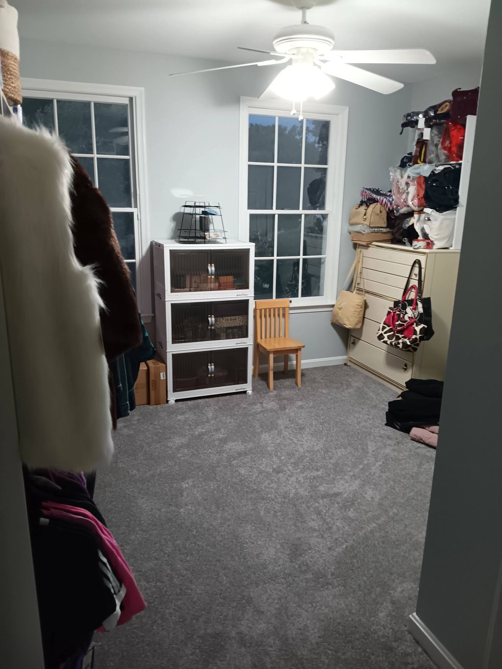 set up & organized room used as closet