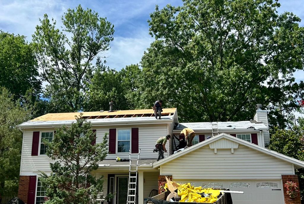 Roof replacement progress - Storm restoration 