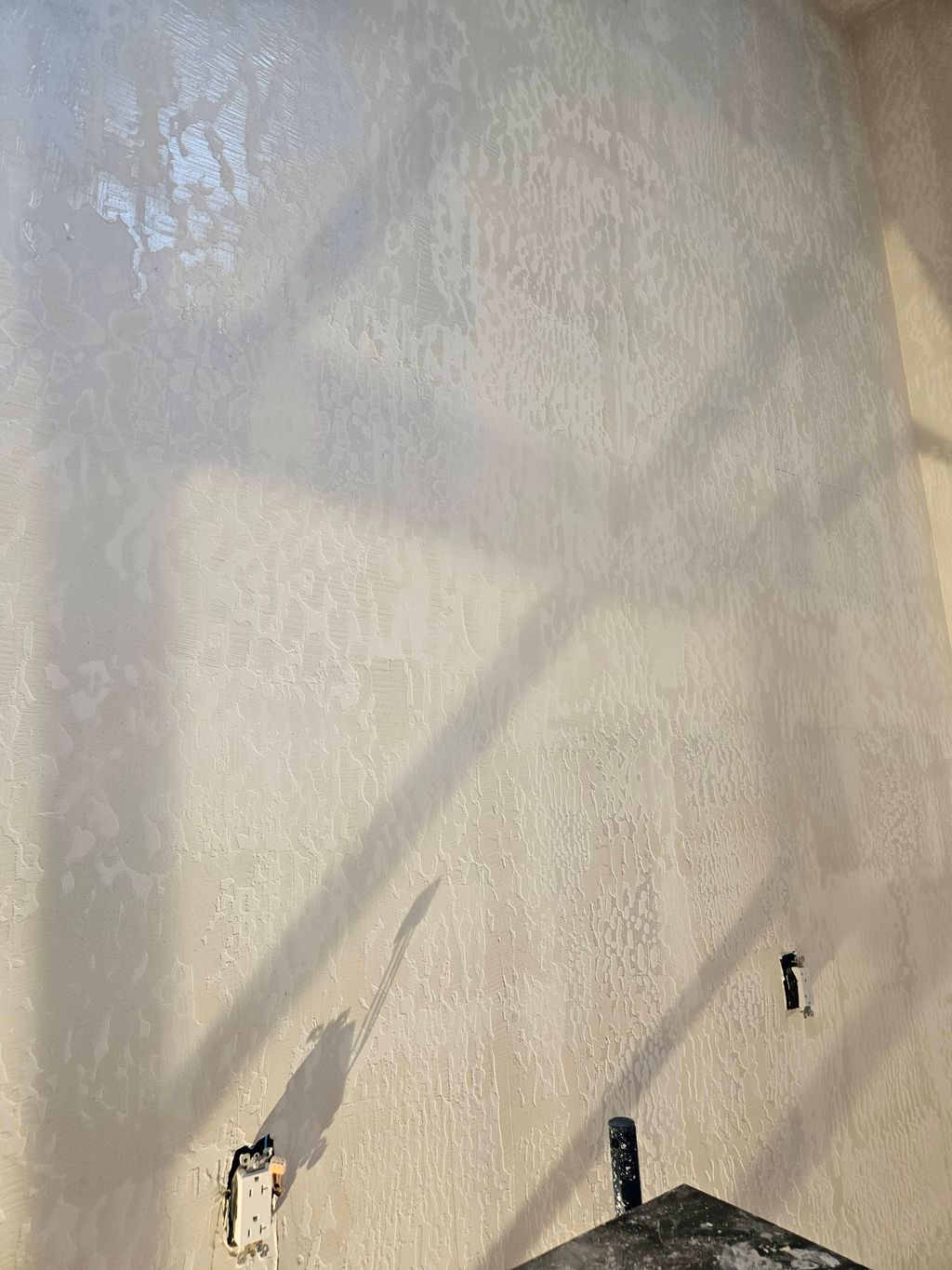 applying skip trowel texture