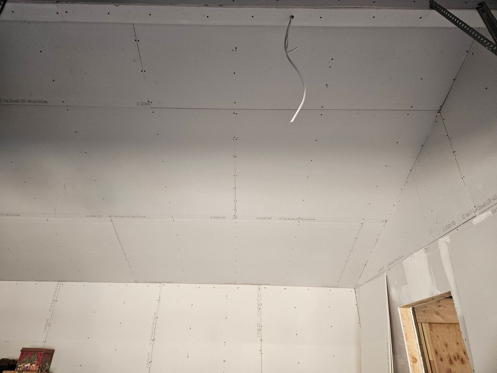 Hanging drywall in a garage
