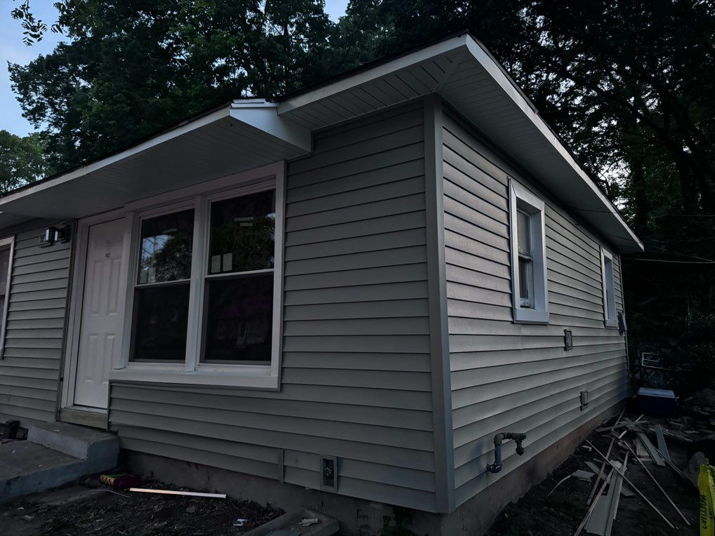 Complete siding install, aluminum wrap and window 