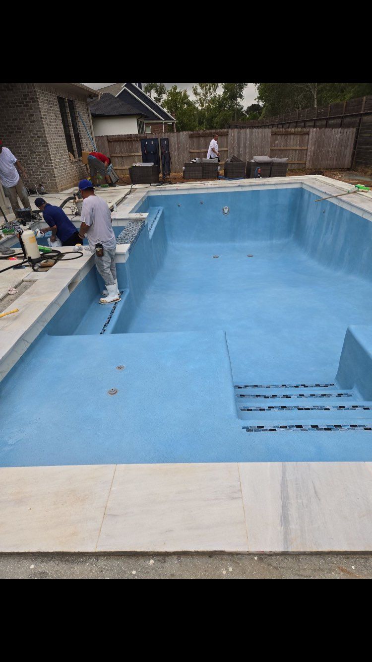 Residential pool in Sugarland, TX with spa and dec