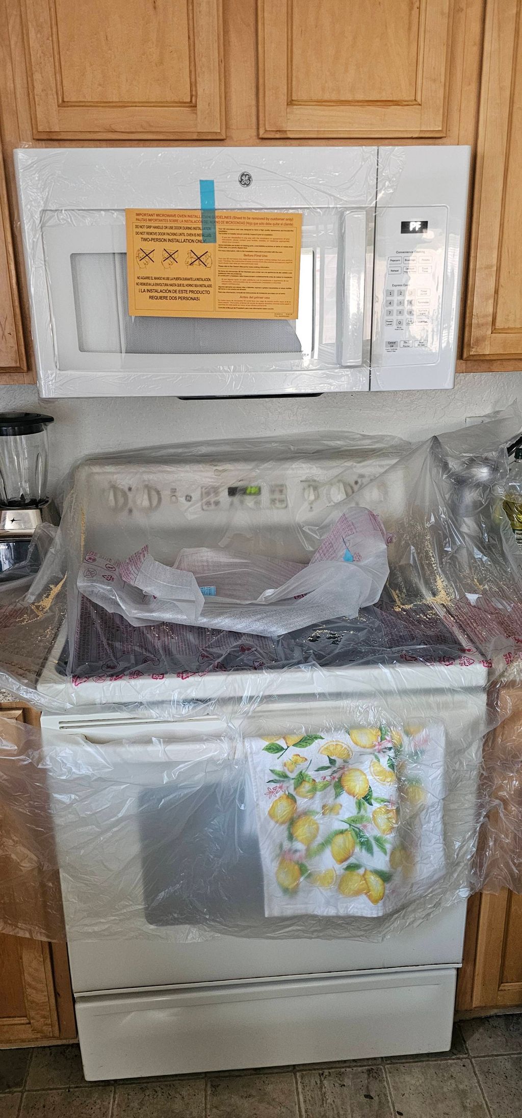 Over the range microwave installation 