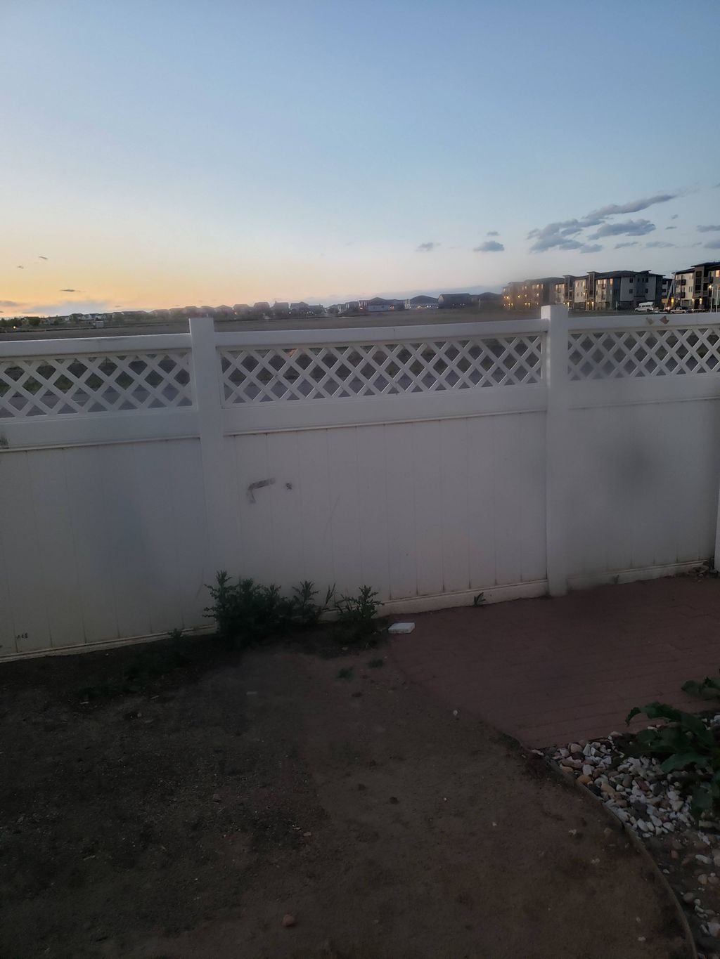 Removing bad vinyl panels on the fence