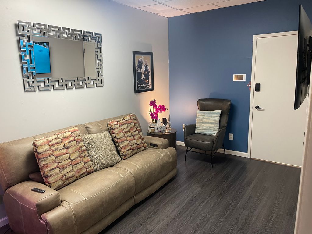 Comfortable client lounge at Vasiliou Law, Queens 