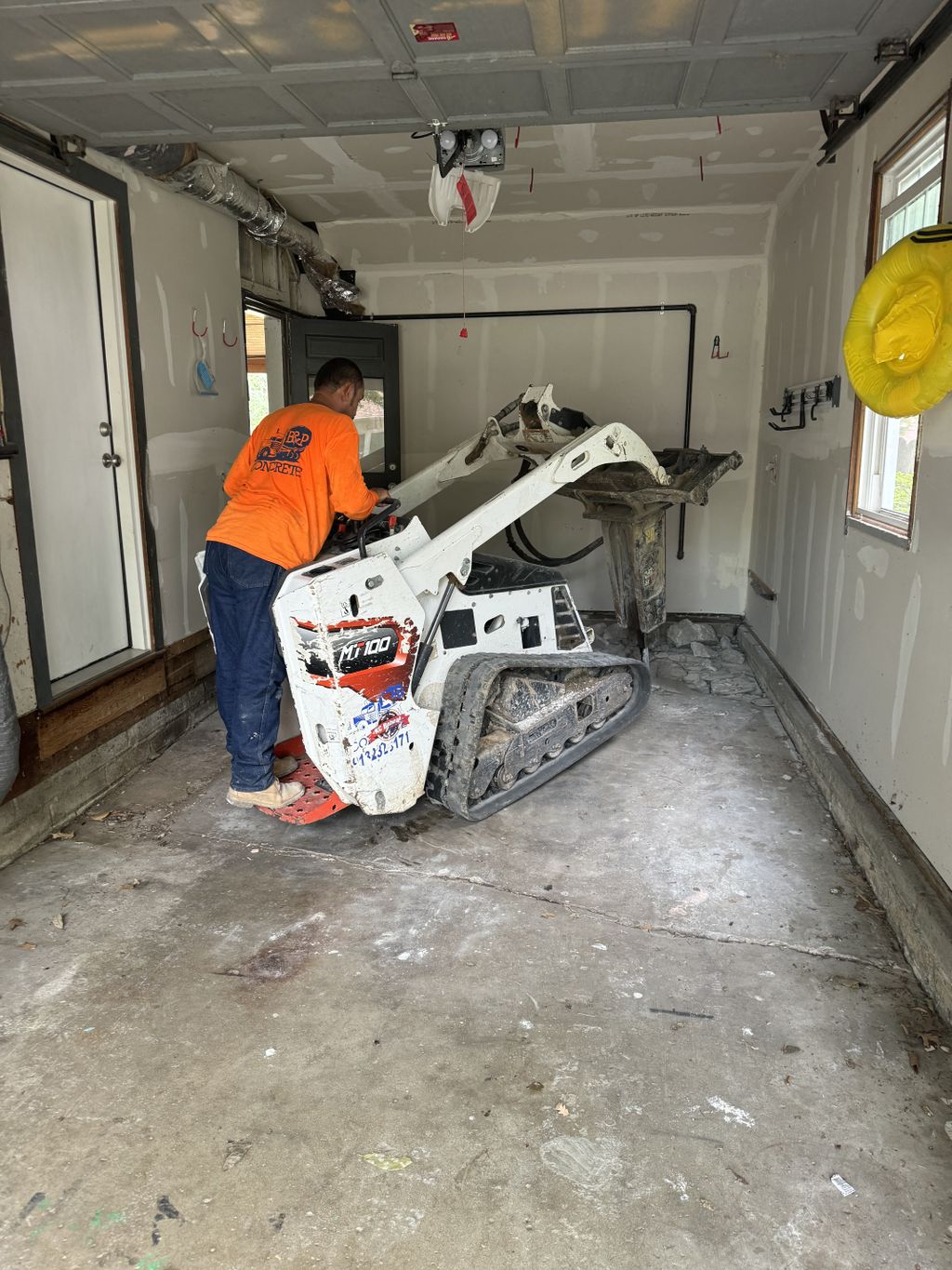 Specialized Equipment Breaking Old Garage Floor