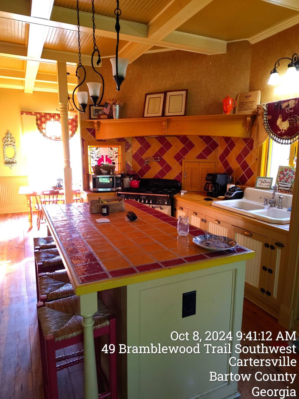 custom. island,  counter top,  backsplash and pot 