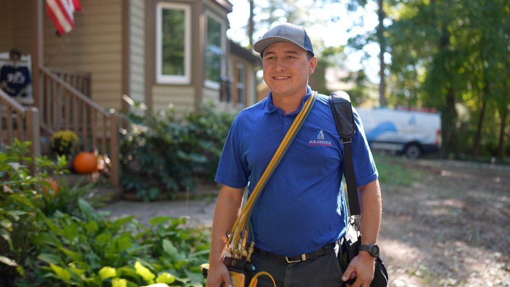 One of our techs on his way to perform AC maintena